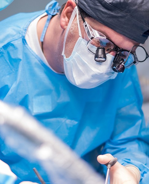 Dentist performing procedure