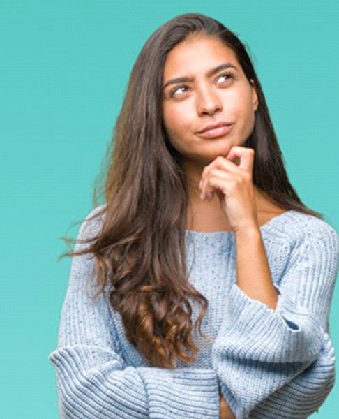 Thinking woman with curious expression on her face