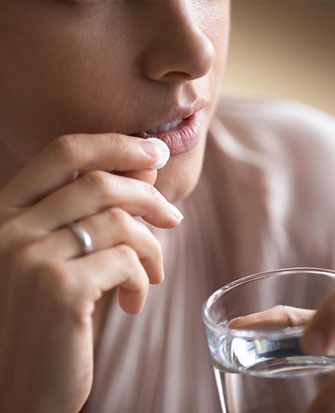 Patient taking oral conscious sedation pill